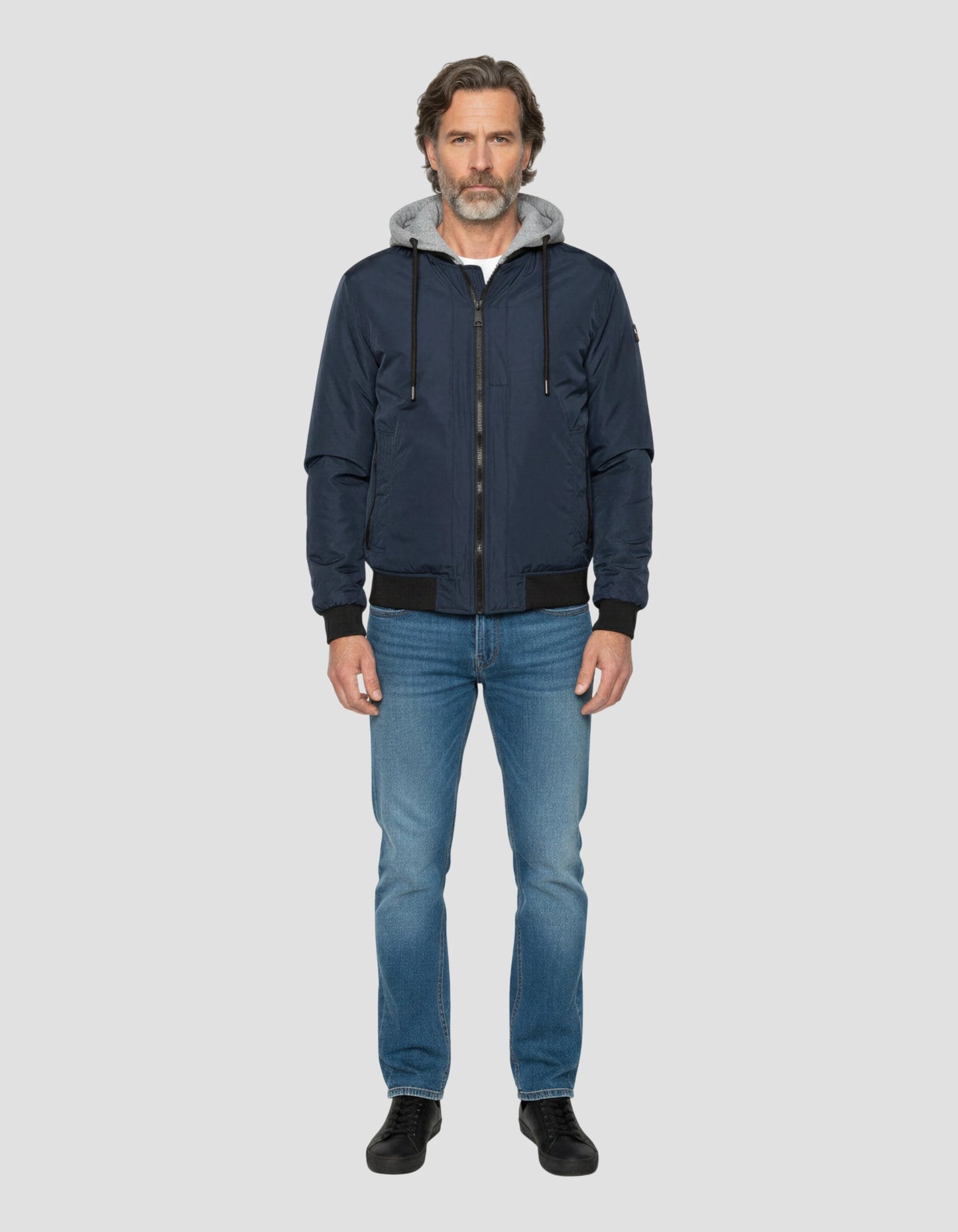 Chaqueta azul marino con capucha con Plastron extraíble