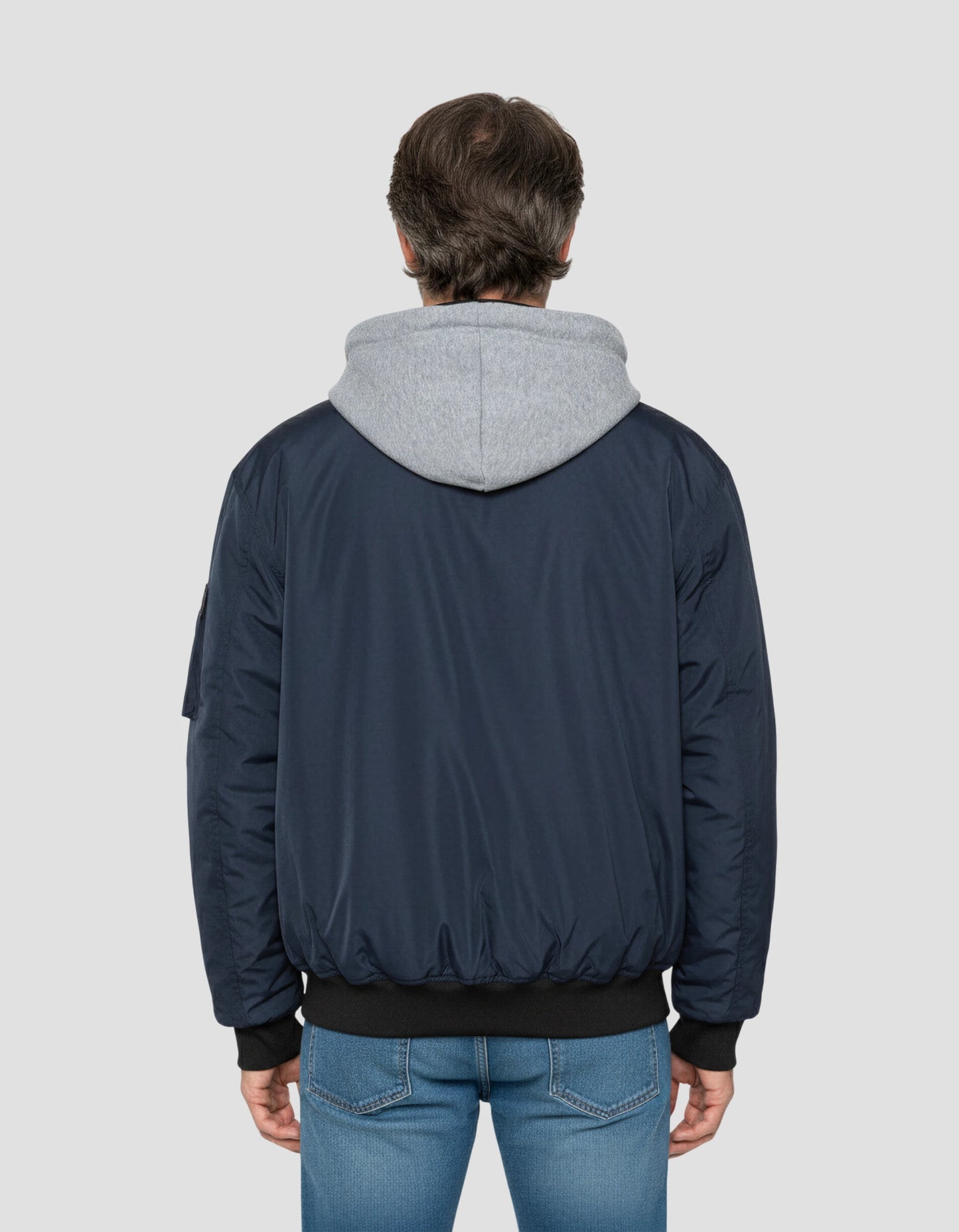 Chaqueta azul marino con capucha con Plastron extraíble